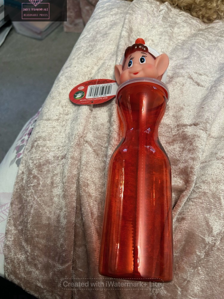 Elf Head Clear Red Plastic Bottle